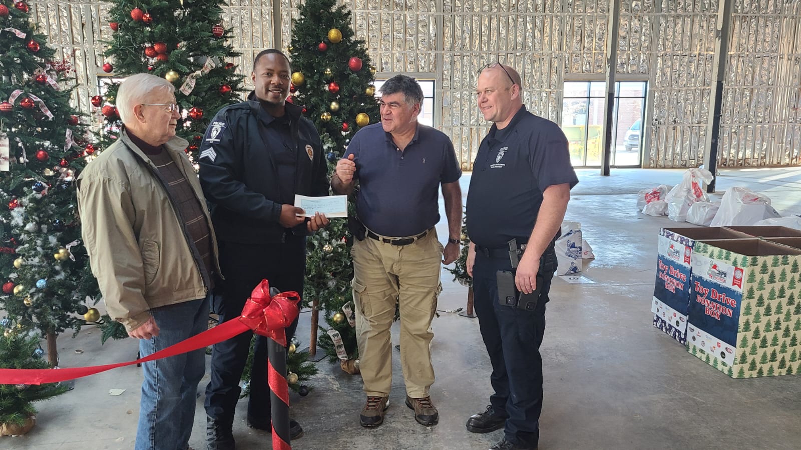 Norooz Charity Foundation holiday donation to the Charlotte Police Department